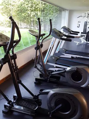 a gym with two exercise bikes next to a window at Morros Epic Cartagena in Cartagena de Indias