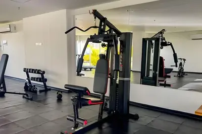 a gym with several tread machines in a room at 1ra Cristal Lagoons de Colombia in Cartagena de Indias