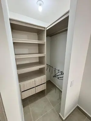 a walk in closet with white walls and shelves at Cartagena, Serena del Mar, Capriella in Manzanillo del Mar