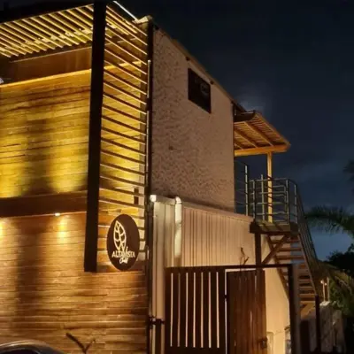 a building with a sign on the side of it at Alta vista Turbaco in Cartagena de Indias