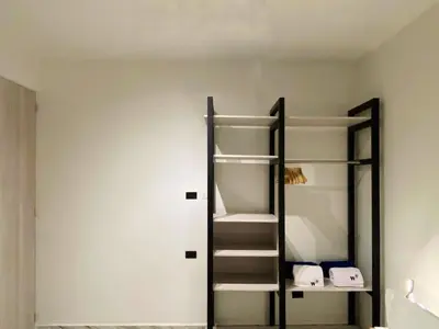 a room with a ladder and some towels at Muralla by Wynwood House in Cartagena de Indias