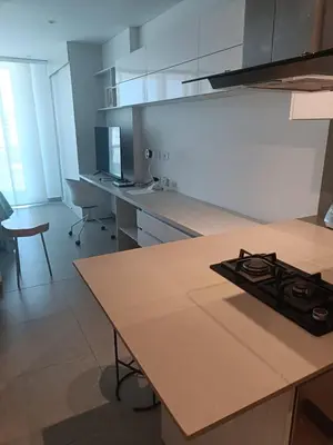 a kitchen with a stove top on a counter at Suite 803 Edif Distrito 90 in Barranquilla