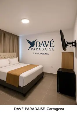 a bedroom with a bed with a dave parabolicannis sign at Davé Paradise in Cartagena de Indias