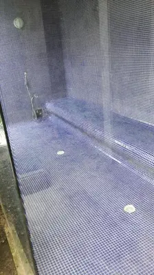 a room with a purple floor with a toilet at Morros Vitri Disfruta de acceso directo a la playa in Cartagena de Indias