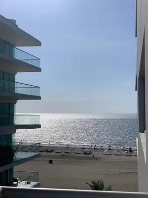 a view of the beach from the balcony of a building at Morros Vitri Disfruta de acceso directo a la playa in Cartagena de Indias