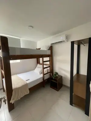 a room with two bunk beds in a room at Sunset47 in Cartagena de Indias