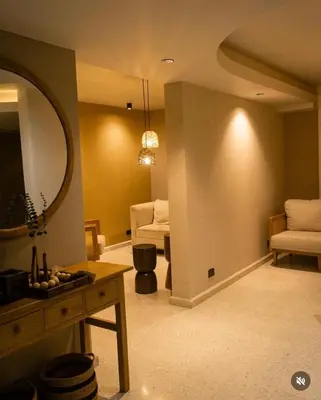 a living room with a mirror and a couch at Sunset 47 mar y vida in Cartagena de Indias