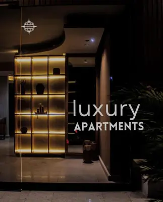an entrance to a lobby with the luxury apartments sign at Sunset 47 mar y vida in Cartagena de Indias