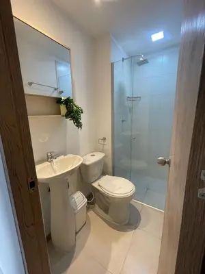 a bathroom with a toilet and a sink and a shower at Sunset 47 mar y vida in Cartagena de Indias