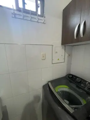 a laundry room with a washing machine in it at Excelente apartaestudio in Sincelejo