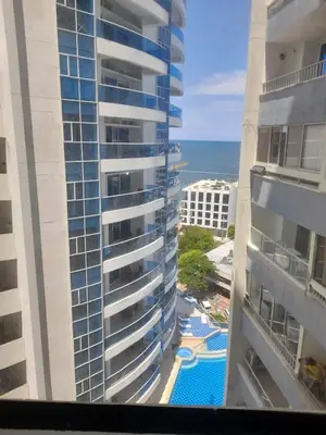 a view of the ocean from the balcony of a building at Apartamento Amoblado in Cartagena de Indias