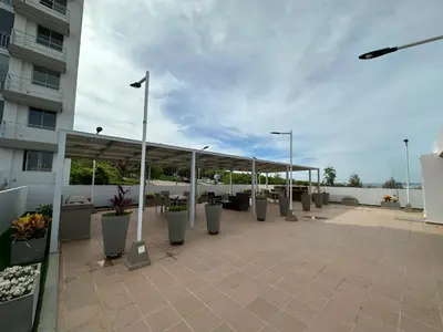 a patio with a pavilion in a building at Apto con vista verde y aire acondicionado in Barranquilla