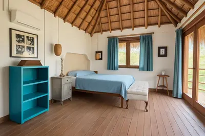 a bedroom with a blue bed and a blue cabinet at Hacienda San Benito in Cartagena de Indias