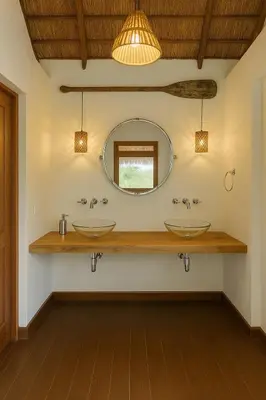 a bathroom with two sinks and a mirror at Hacienda San Benito in Cartagena de Indias
