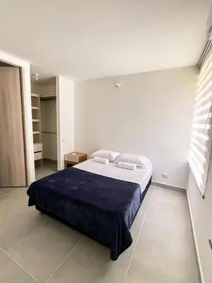 a bedroom with a large bed in a room at 