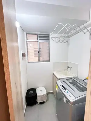 a small kitchen with a stove and a sink at 