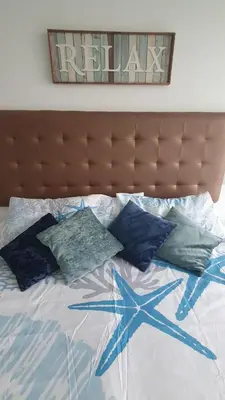 a bed with a starfish on top of it at Luxurious, modern apartment in Cartagena Morros 3 in Cartagena de Indias