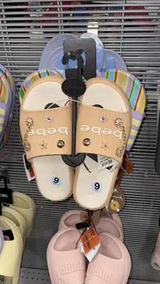 a group of shoes on display in a store at Shantyhostal in Cartagena de Indias