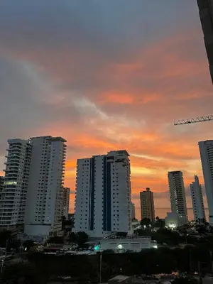 a city skyline with tall buildings at sunset at Apartamento en Torices in Cartagena de Indias