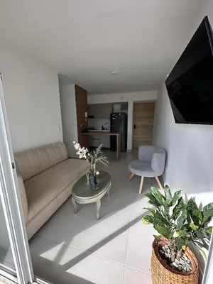 a living room with a couch and a table at Apartamento en Torices in Cartagena de Indias