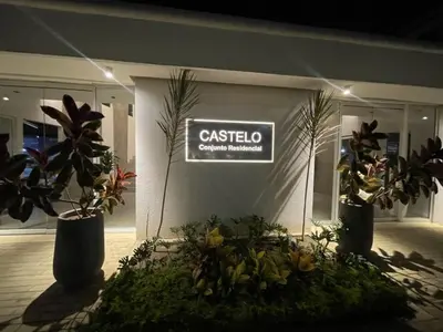 a casico sign on the side of a building with plants at Castelo - Serena Del Mar in Puerto Tierrabaja