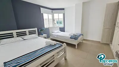 a bedroom with two beds in a room at Apartamentos Torres Del Lago Por Parceros Group in Cartagena de Indias