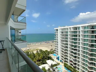 a view of the beach from the balcony of a building at Hotel Radisson Residences Ocean Pavillion in Cartagena de Indias