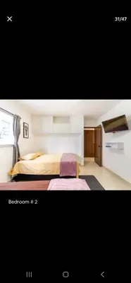 a bedroom with a bed in a room at El Laguito Apartamento in Cartagena de Indias