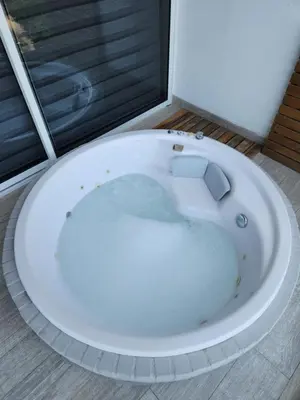 a toilet bowl with water in it in a bathroom at Dominique 609 Apartment with private jacuzzi in Cartagena de Indias