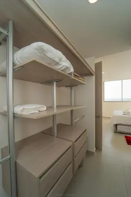 a room with bunk beds and a bed in a room at Premium Hub Ocean View Apartment in Cartagena 905 in Cartagena de Indias