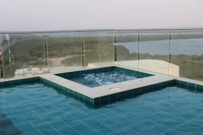 a swimming pool on top of a building at Premium Hub Ocean View Apartment in Cartagena 905 in Cartagena de Indias