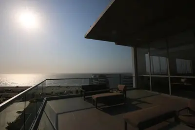a balcony of a house with a view of the ocean at Premium Hub Ocean View Apartment in Cartagena 905 in Cartagena de Indias