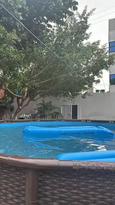 a large blue swimming pool with blue water at Stay Mar y Playa House in Cartagena de Indias
