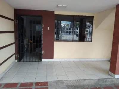 an entrance to a building with black barred doors at Habitacion privada con servicios incluidos in Barranquilla