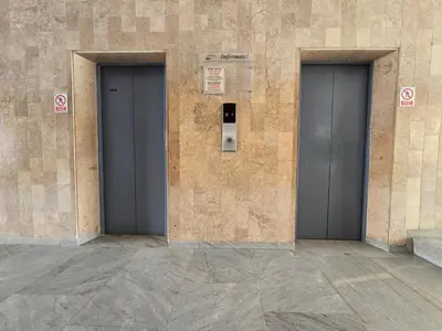 two doors on the side of a building at Moderna suite con balcón a pasos de la playa in Cartagena de Indias
