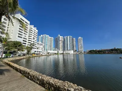 a large body of water in front of some buildings at Moderna suite con balcón a pasos de la playa in Cartagena de Indias