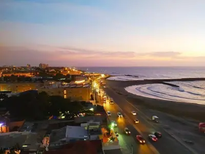 an aerial view of the beach at night at apartamento con vista al mar y centro histórico in Cartagena de Indias