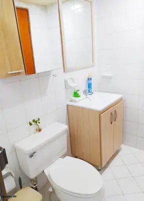 a bathroom with a toilet and a sink at apartamento con vista al mar y centro histórico in Cartagena de Indias