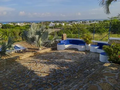 a group of blue and white toilets on a patio at Liz&Mar Glamping in Tubará