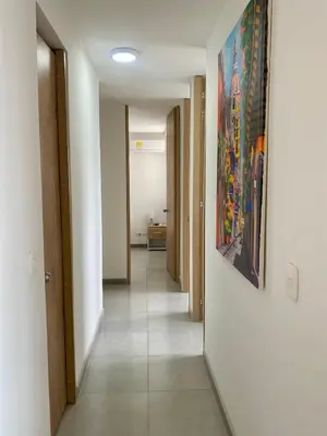 a hallway with a painting on the wall at U-GO Sunset Frente al Mar in Cartagena de Indias