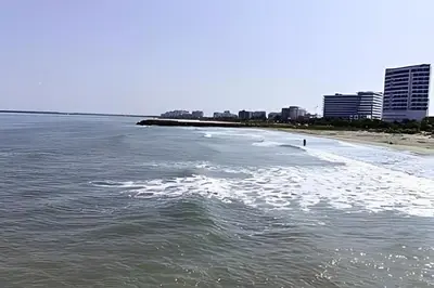 a body of water with a beach and buildings at Playa, Vista al mar y Comodidad, ubicación perfecta in Cartagena de Indias