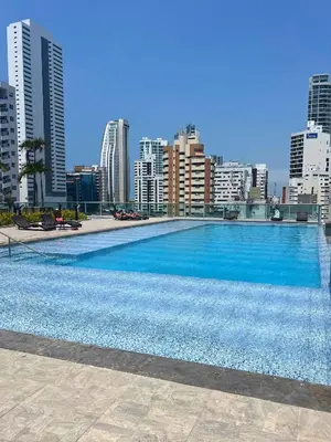 a large swimming pool on top of a city skyline at Chic Apartment Near It All in Cartagena de Indias