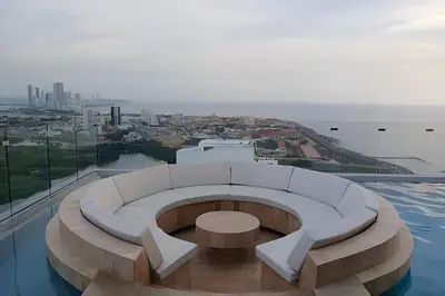 a white couch sitting on top of a building at New Gem, 2B, 4 blocks from Center Amazing Views in Cartagena de Indias
