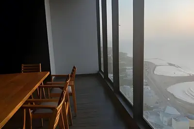 a dining room with a table and chairs and a window at New Gem, 2B, 4 blocks from Center Amazing Views in Cartagena de Indias
