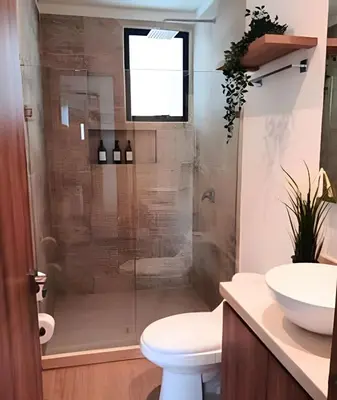 a bathroom with a shower with a toilet and a sink at Luxury 2B, stunning View 4 Blocks from walled City in Cartagena de Indias