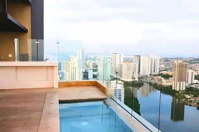 a swimming pool on the roof of a building at Luxury 2B, stunning View 4 Blocks from walled City in Cartagena de Indias