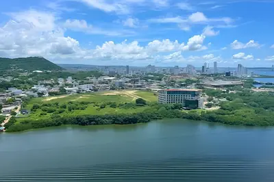 an aerial view of a city and a lake at Brand New Apt Pool & City Views in Cartagena de Indias