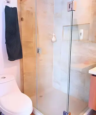 a bathroom with a shower and a toilet at Stuning view to Walled city & Beach, King size bed in Cartagena de Indias