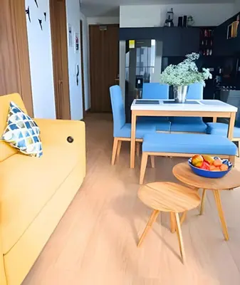 a living room with a table and a couch at Oceanfront Gem by Walled City, Spectacular Views in Cartagena de Indias