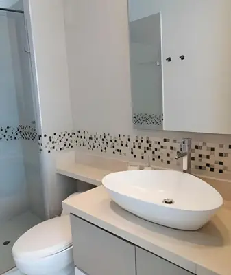 a white bathroom with a sink and a toilet at Luxury 2B apartment, Amazing View in Cartagena de Indias